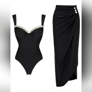 Elegant Black Bodysuit and Skirt Set with Pearl Accents